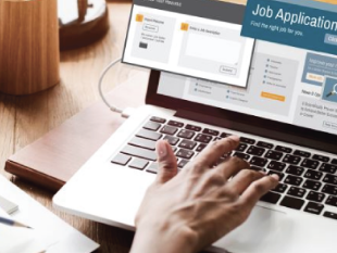 a person on a laptop applying for jobs