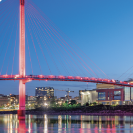 the omaha pedestrian bridge at nightfall